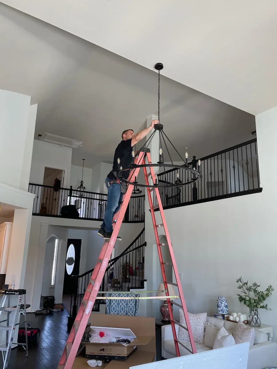 Chandelier installation in a Collin County home
